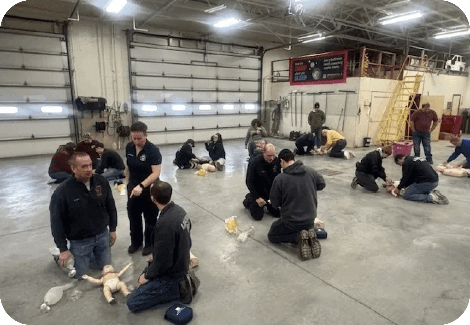 CPR training session in a spacious facility.